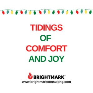 BMK Graphic that says, "Tidings of Comfort and Joy." Christmas lights decorate the top.