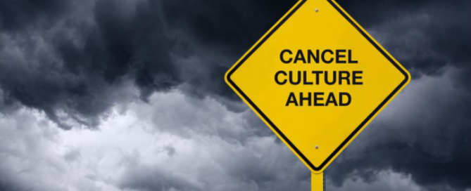 Picture of a warning sign that says, "Cancel Culture Ahead." The background is a dark, stormy sky.